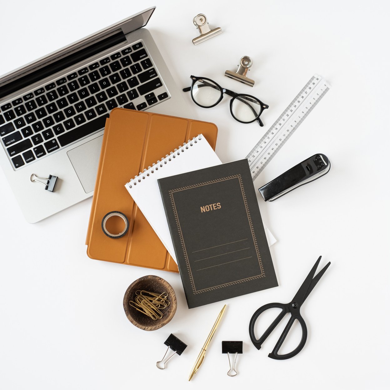 Electronics and Stationery on Work Desk 